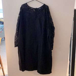 Black dress with lace sleeves and neckline